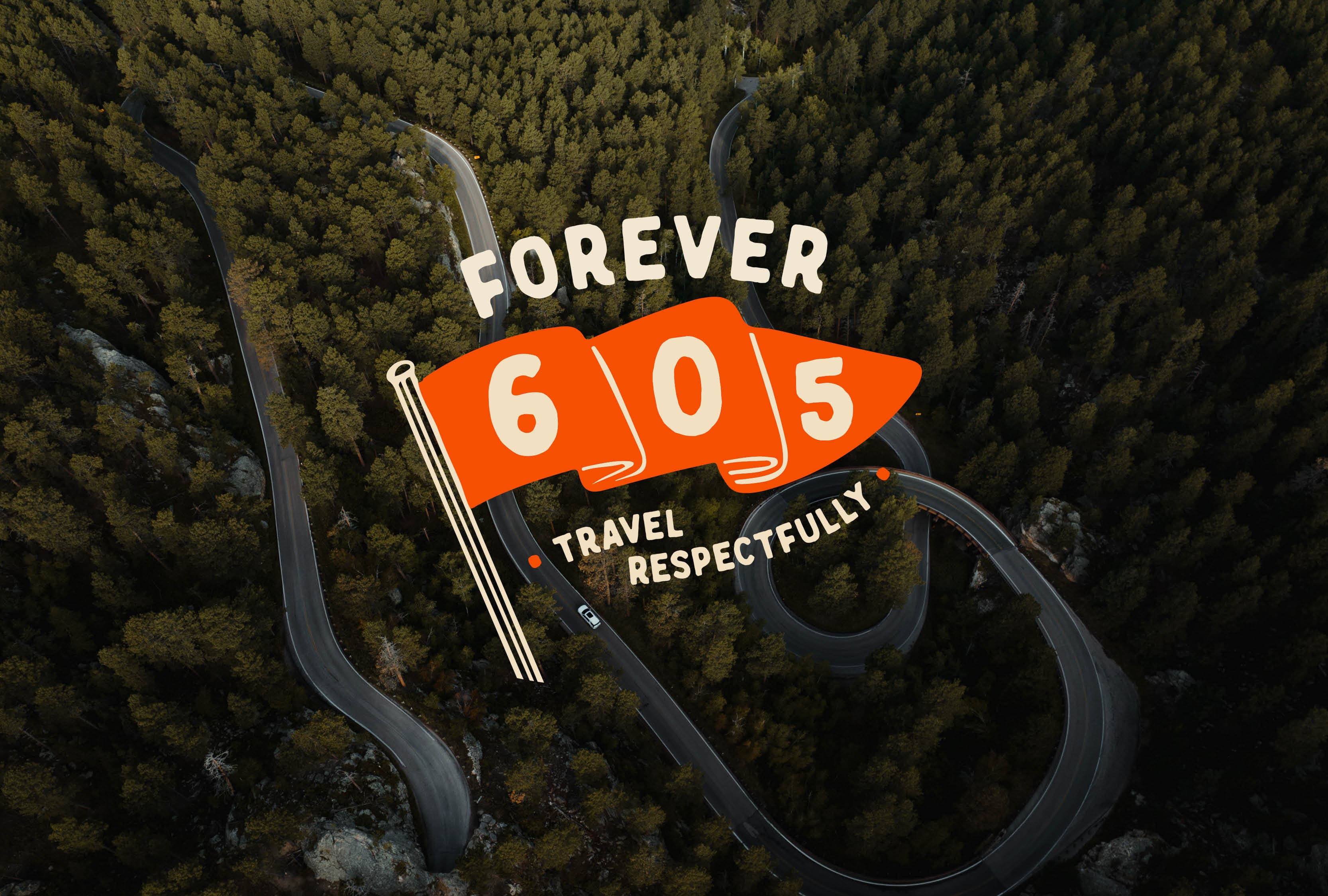 The Forever 605 logo (feature 605 on an orange flag) sits atop an overhead shot of the roads and trees of the Black Hills