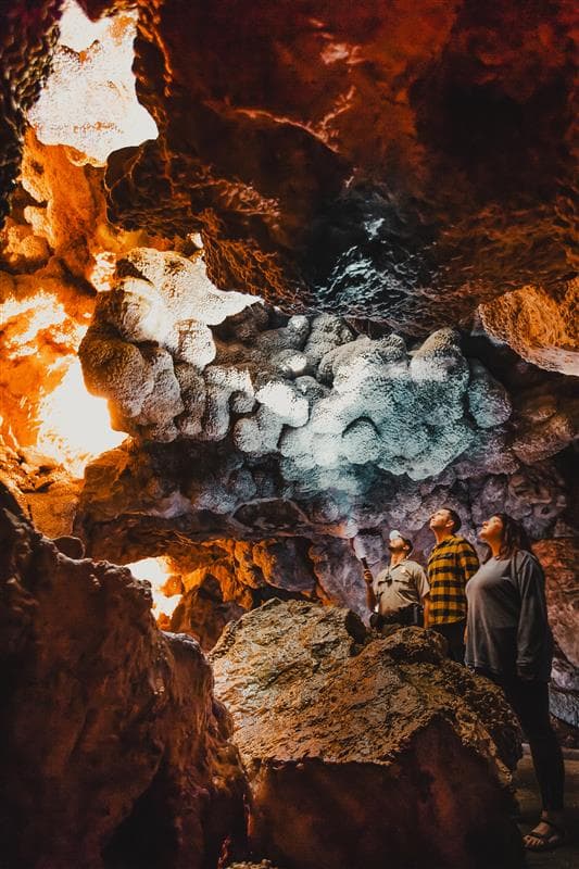 Tourists stand inside Jewel Cave in the Black Hills of South Dakota