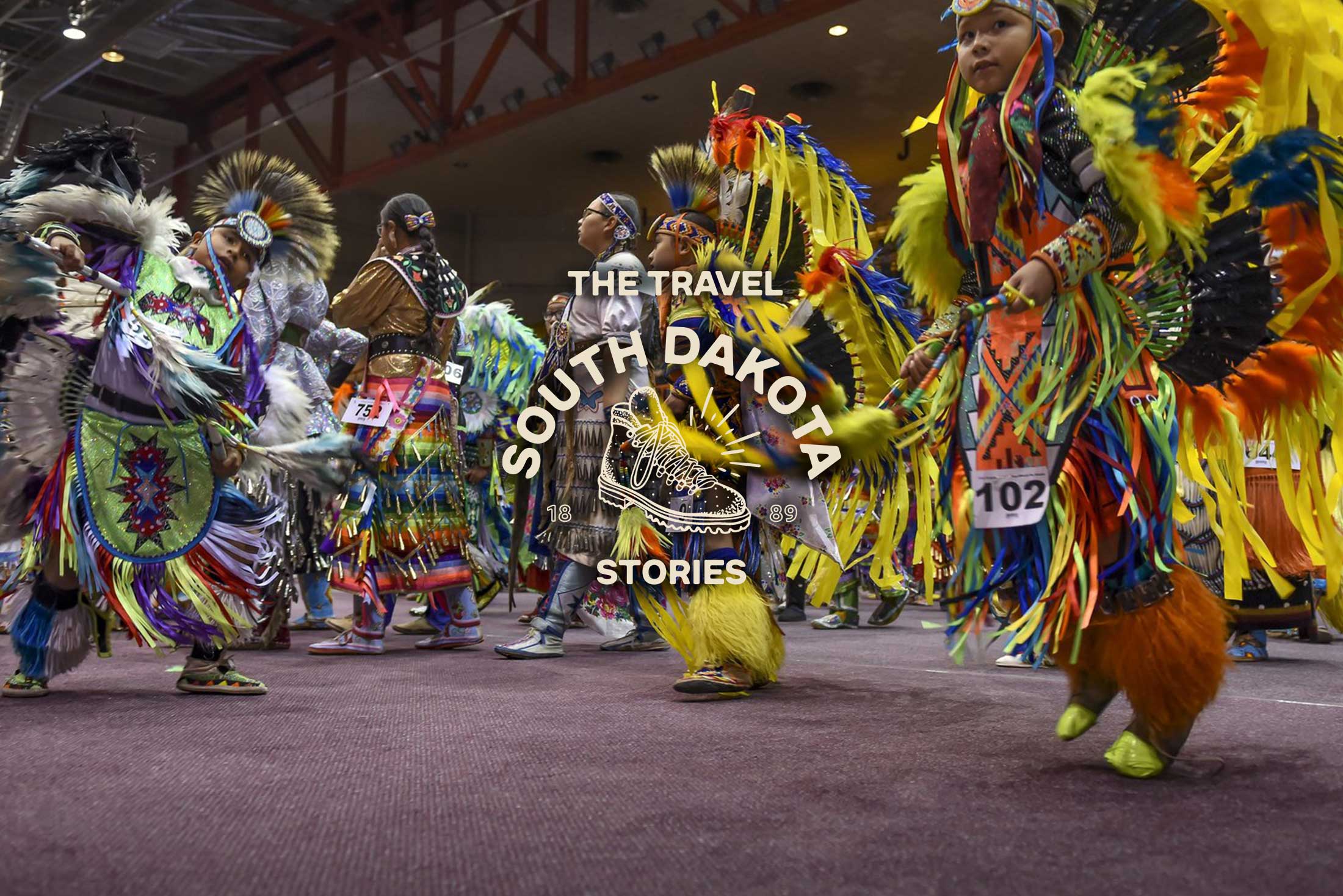 Native dancers in full regalia at the Black Hills Powwow.