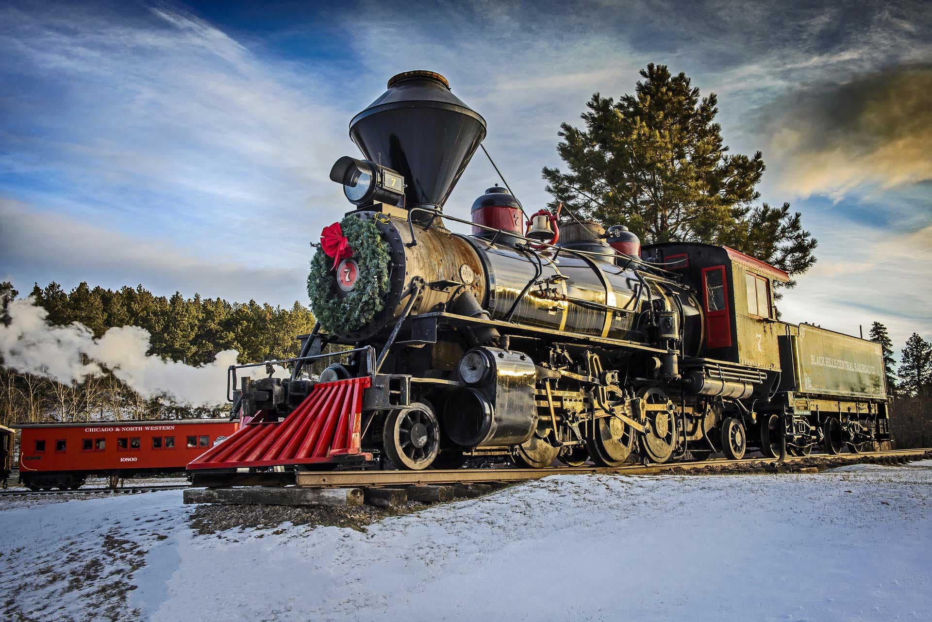 The 1880 Train adorned with holiday decorations