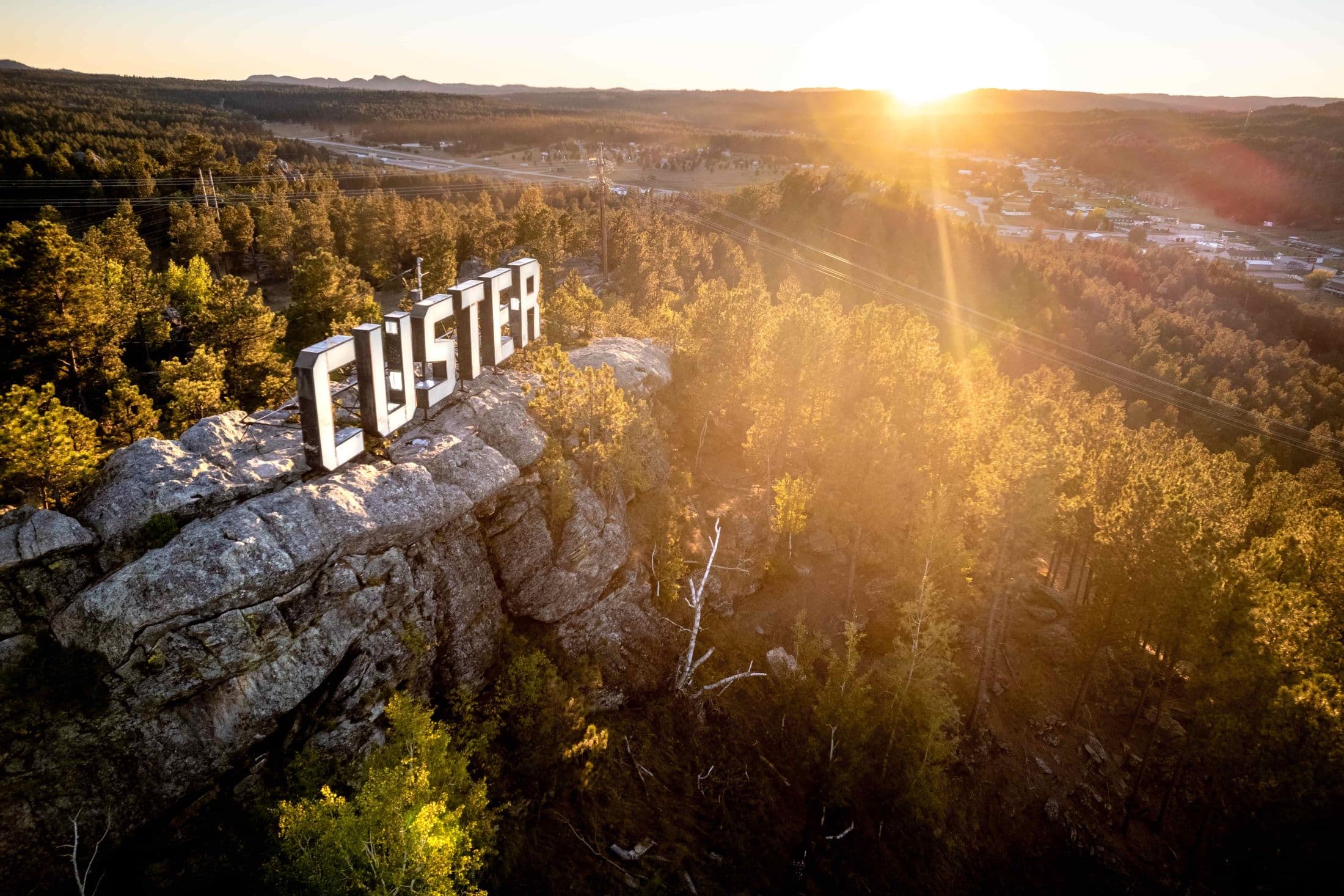 Custer Sign with sun