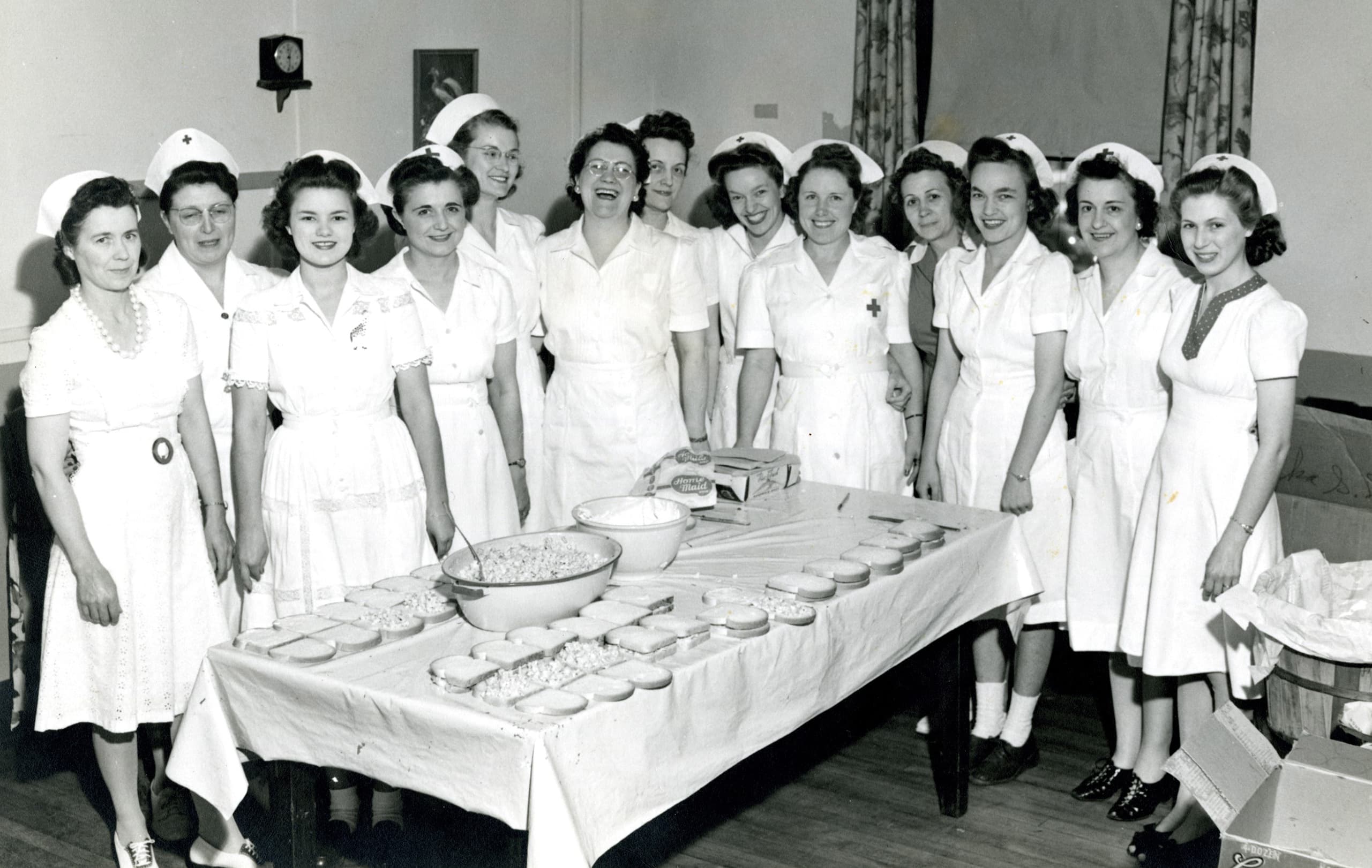 Ladies serving troops pheasant sandwiches