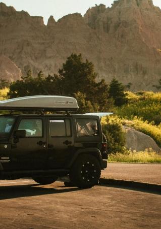 Jeep with Camp Gear on top in South Dakota