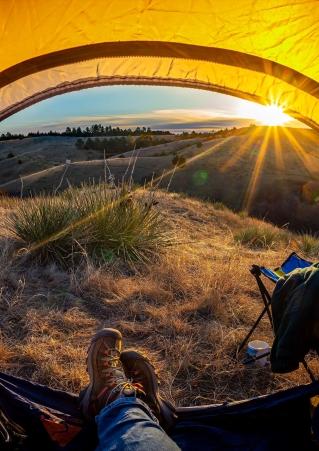 Camping - feet sticking out of tent