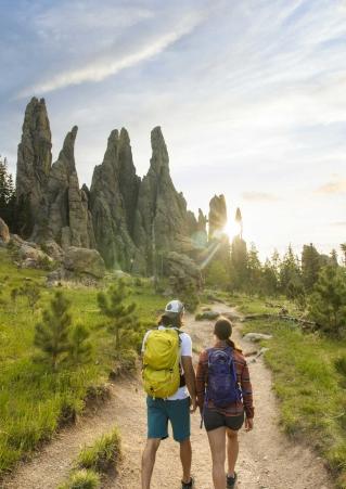 Couple hiking to Hill City’s Cathedral Spires 