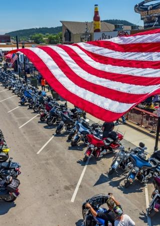 Hundreds of bikes on Main Street for Military Appreciation Day at Sturgis Motorcycle Rally.
