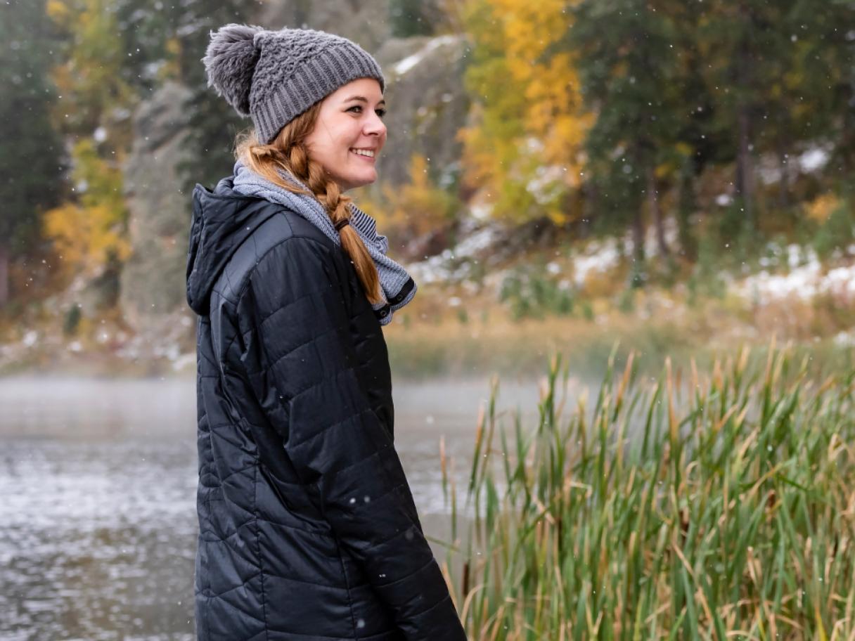 Girl hiking near river