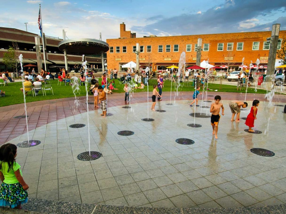 Kids playing in fountain in Main Street Square