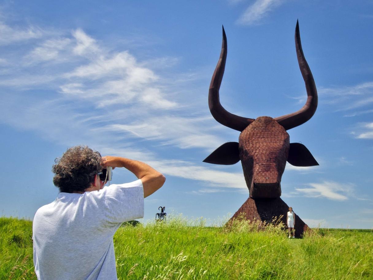 Bull head and visitor - Porter Sculpture Park