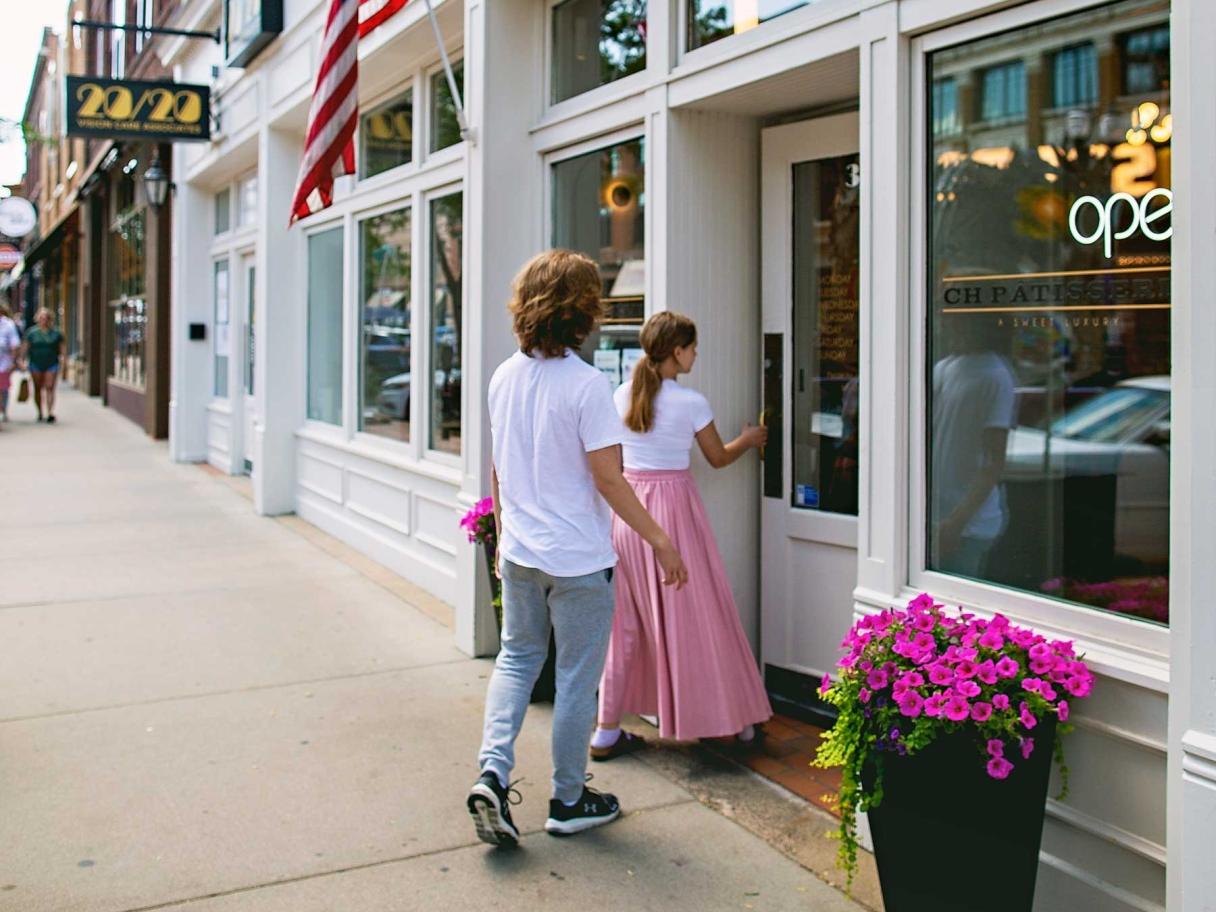 Teens walking into CH Patisserie