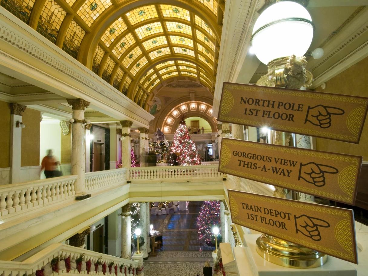 Signs hanging in the Capitol during Christmas at the Capitol