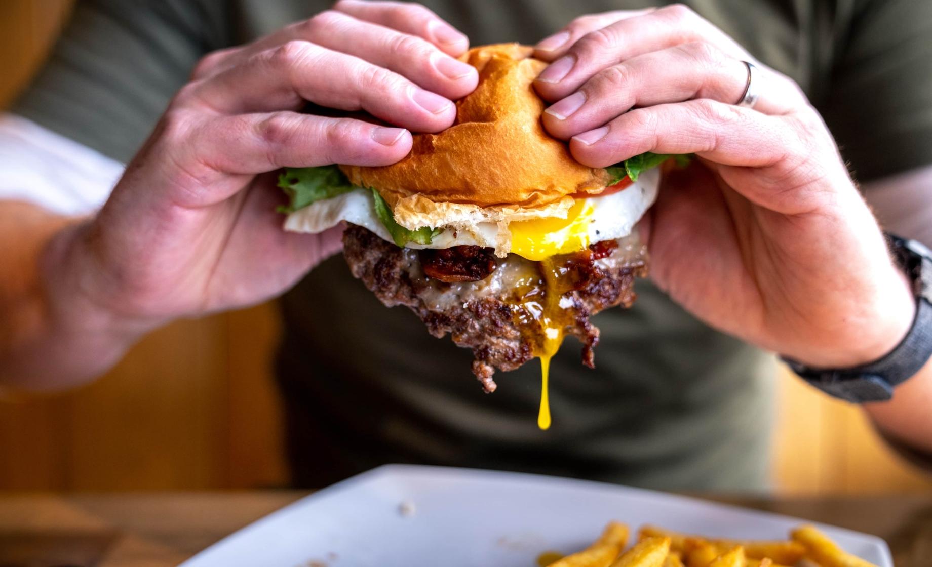 Black Hills Bun and Burger dripping burger yum yum