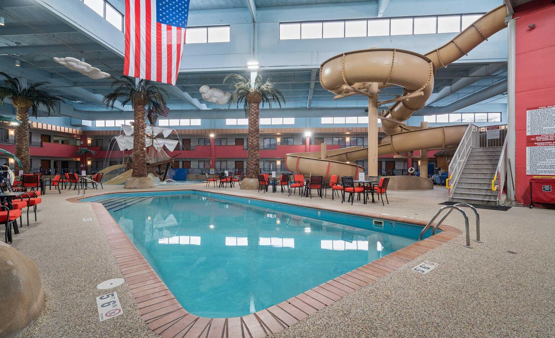 Indoor swimming pool and slides at Ramada Sioux Falls. Sioux Falls, South Dakota.