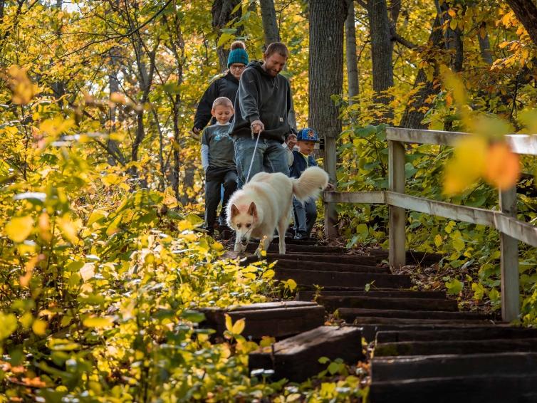 Family hiking Sica Hollow in fall
