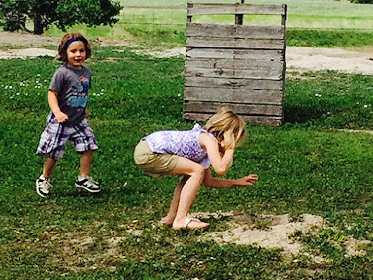 Kids playing with a prairie dog