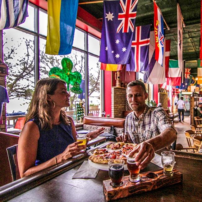 Couple dining indoors at WWII Pheasant Canteen