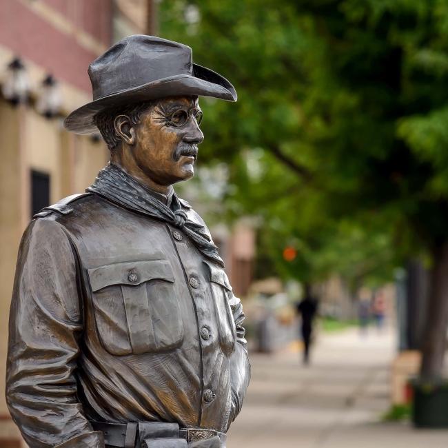 With cowboy hat and sword, the statue of Teddy Roosevelt stands tall in downtown Rapid City