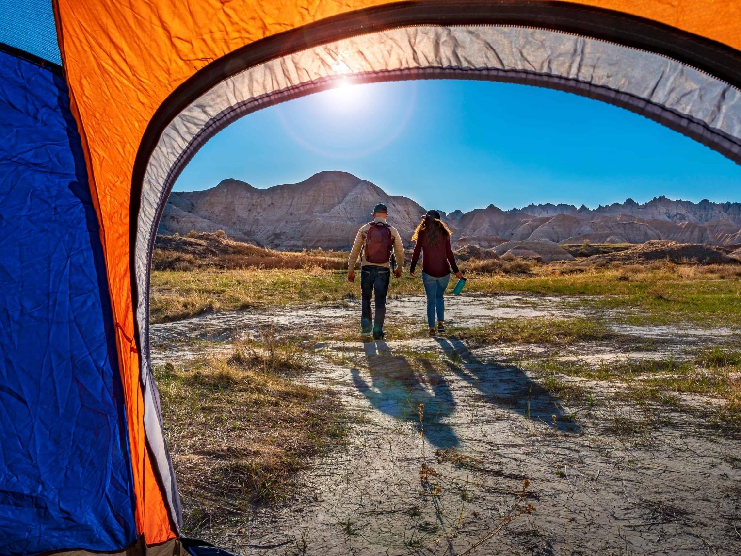 Couple and tent at Badlands