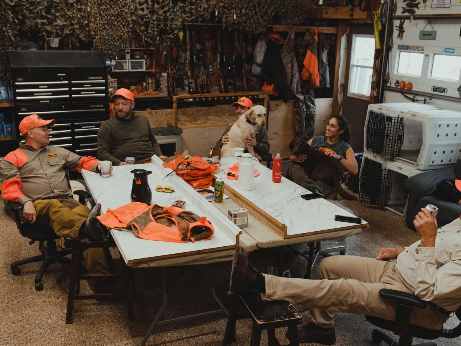 Group of pheasant hunters gathered around a table in South Dakota