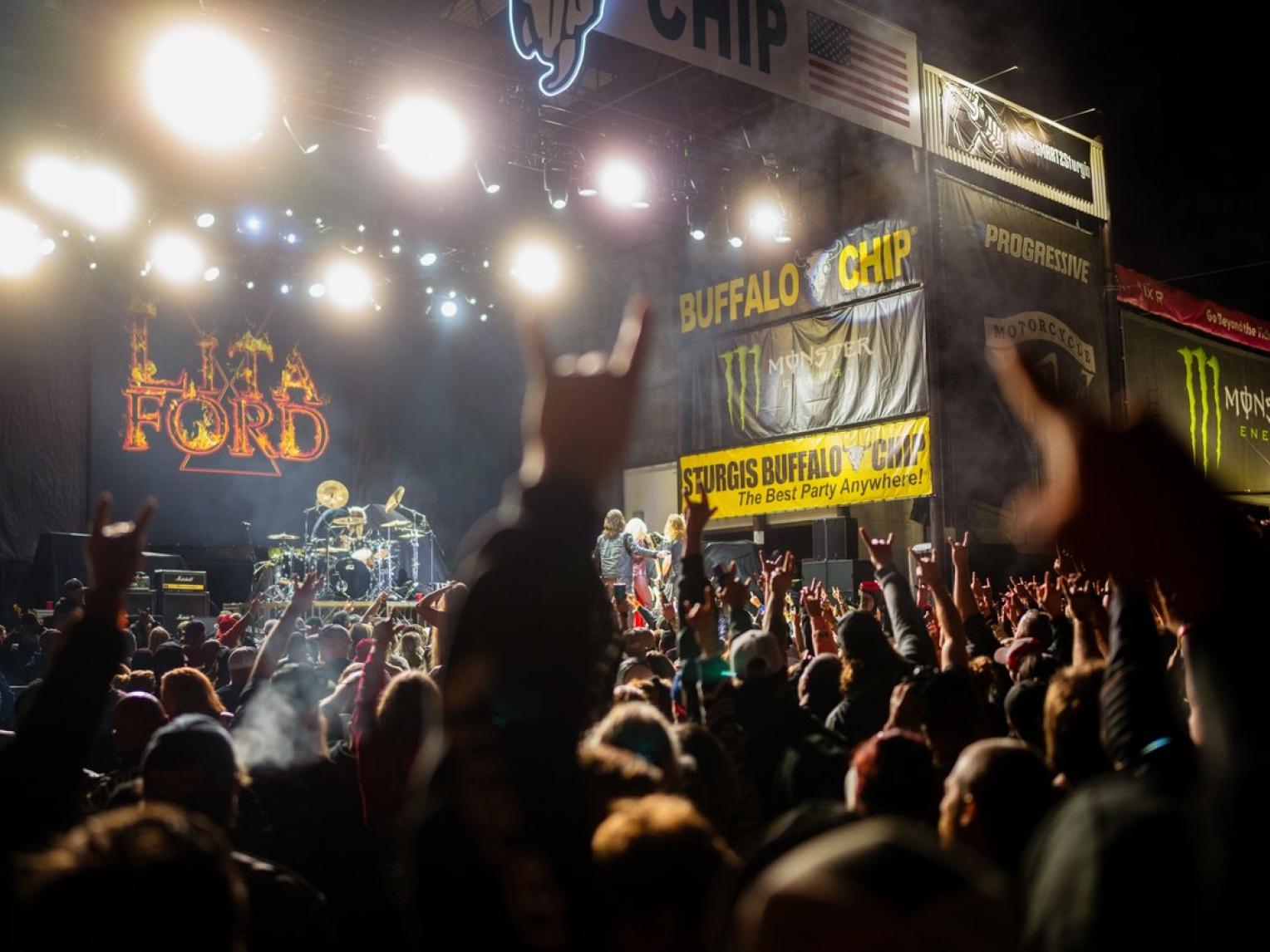 Large crowd of people at the Sturgis Rally concerts at Buffalo Chip.