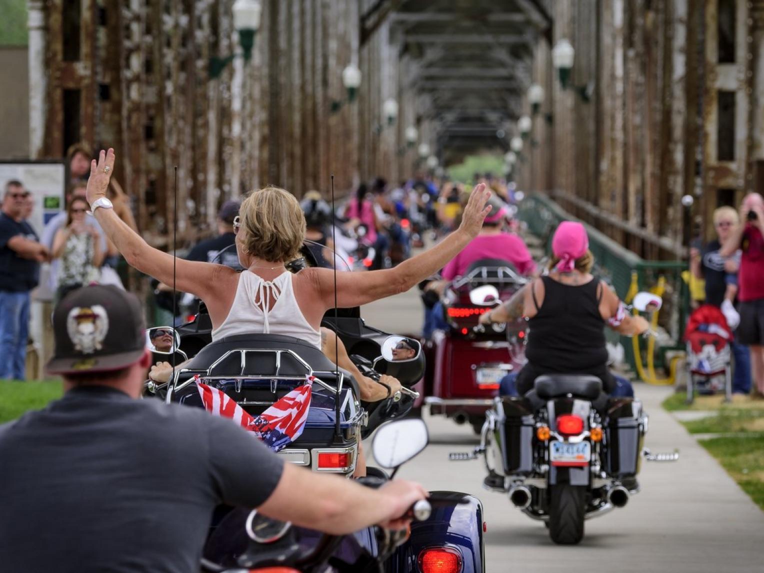 Dozens of people on motorcycles riding into Yankton for the annual Rock 'n Rumble