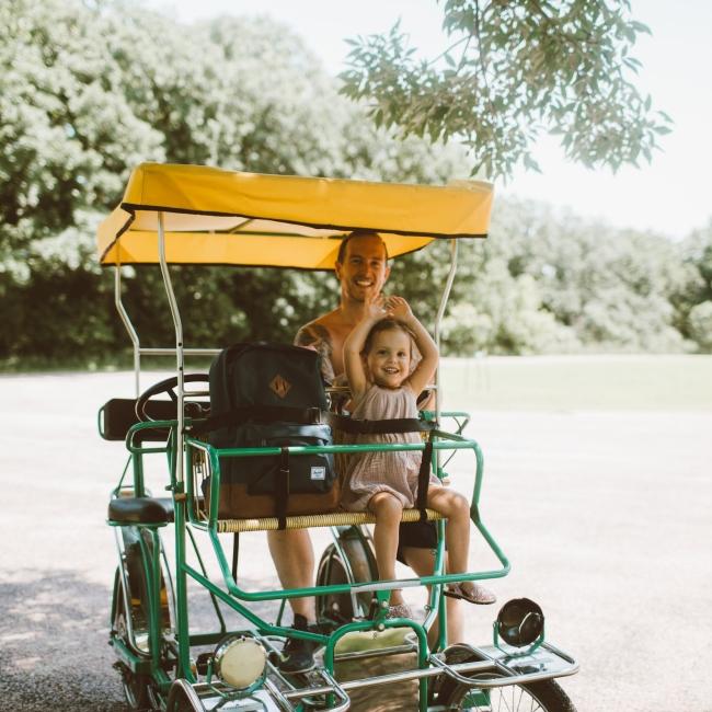 Dad and daughter in trolley