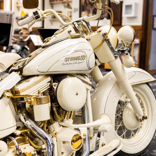 A white motorcycle on display at the Sturgis Motorcycle Museum & Hall of Fame. Sturgis, SD.