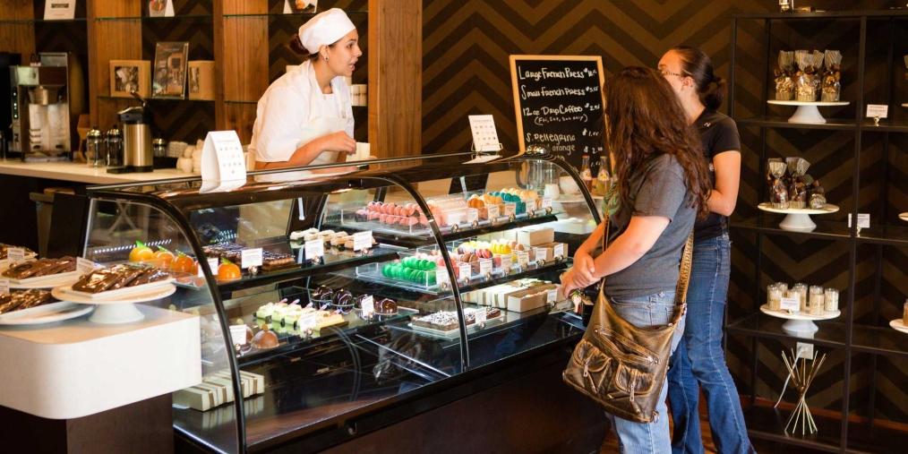 Customers ordering pastries at CH Patisserie