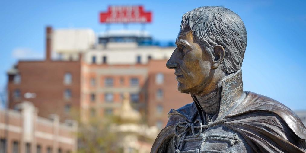 A profile shot of the William Henry Harrison statue in downtown Rapid City