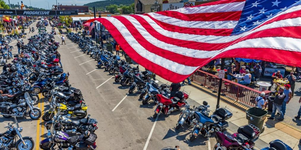 Hundreds of bikes on Main Street for Military Appreciation Day at Sturgis Motorcycle Rally.
