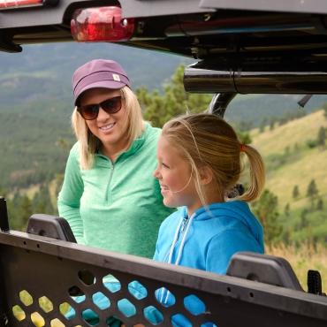 Mom and daughter in ATV