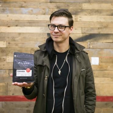 Wes holding coffee