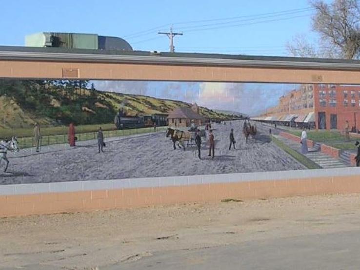 Minnekahta Avenue mural, by Del Iron Cloud, Hot Springs