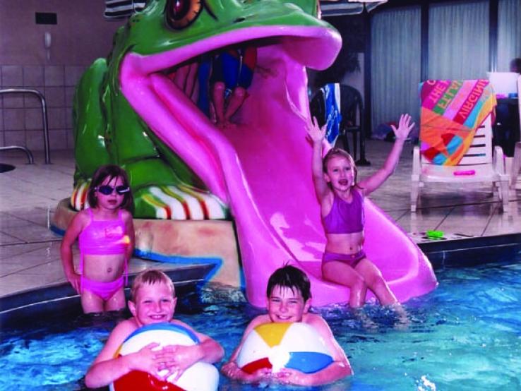 Indoor pool with frog slide