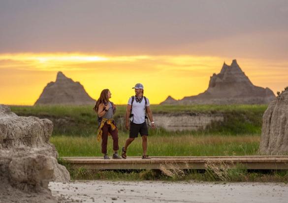 Two hikers in the Badlands