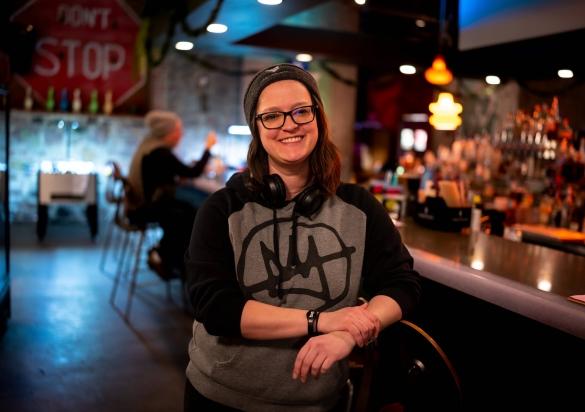 Lyndsey Kastein stands for a picture in Sioux Falls during the Downtown Burger Battle