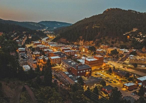 An aerial view of Historic Deadwood at night.
