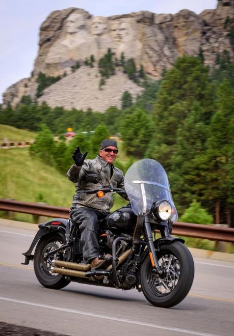 Motorcycle with Rushmore in background