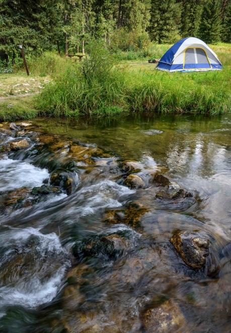 Tent and water at Hanna Campground