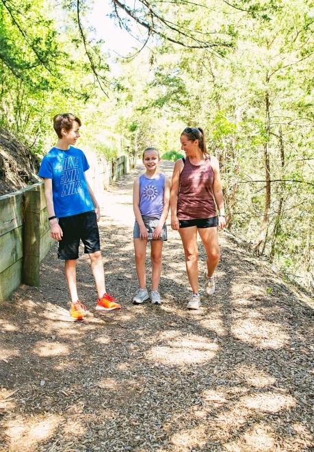 Mom and two kids hiking