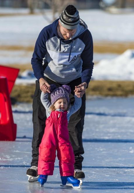 Ice Skating father and daughter