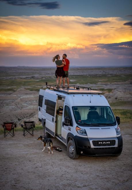 Couple embracing at sunset on a van at Buffalo Gap National Grassland