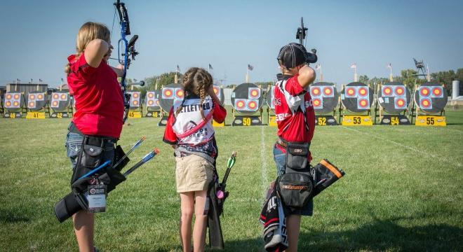 Kids shooting bows